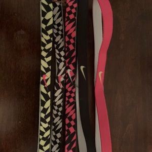 Set of 5 Nike headbands.